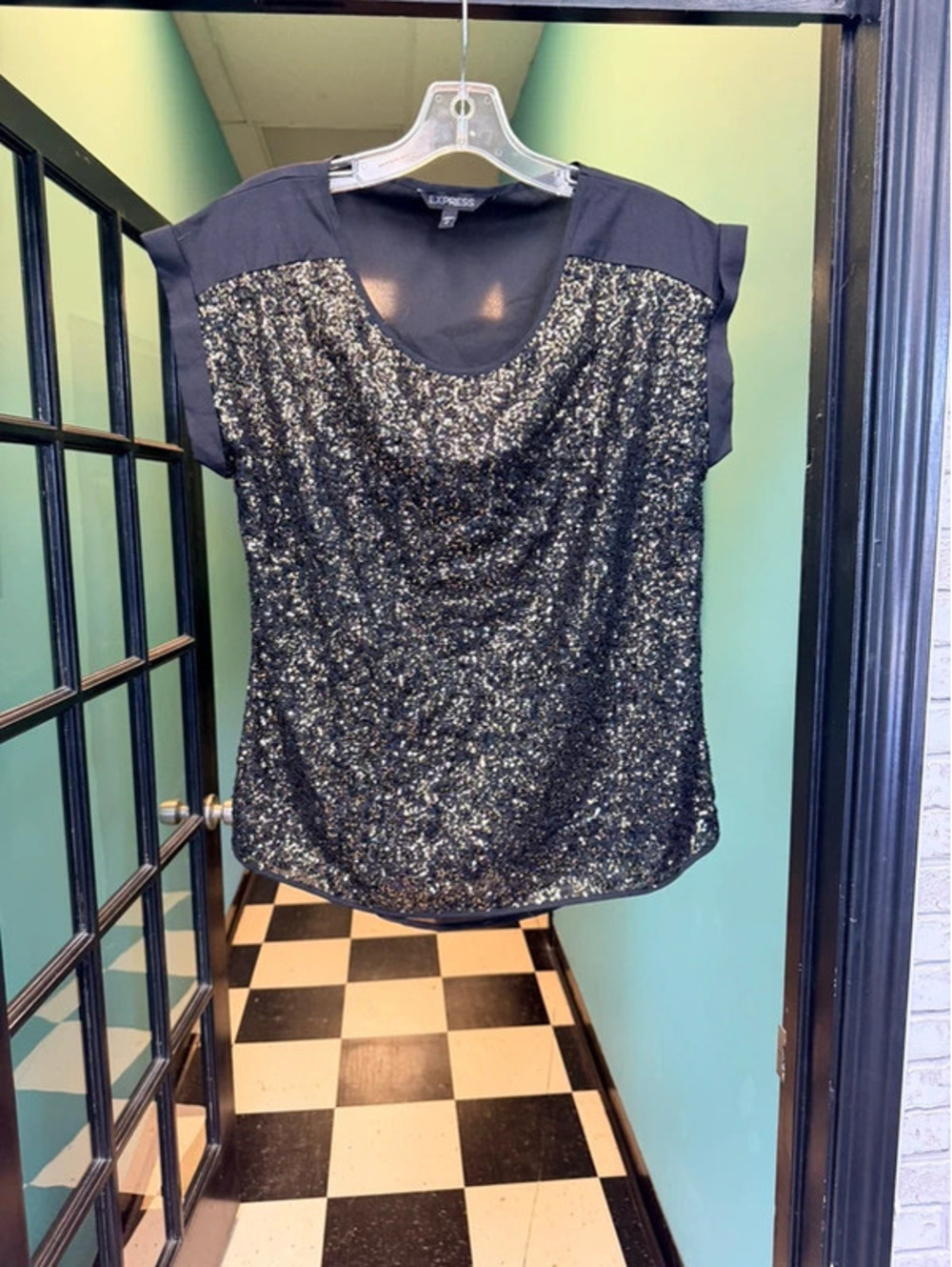 Black Express top with gold sequins on front